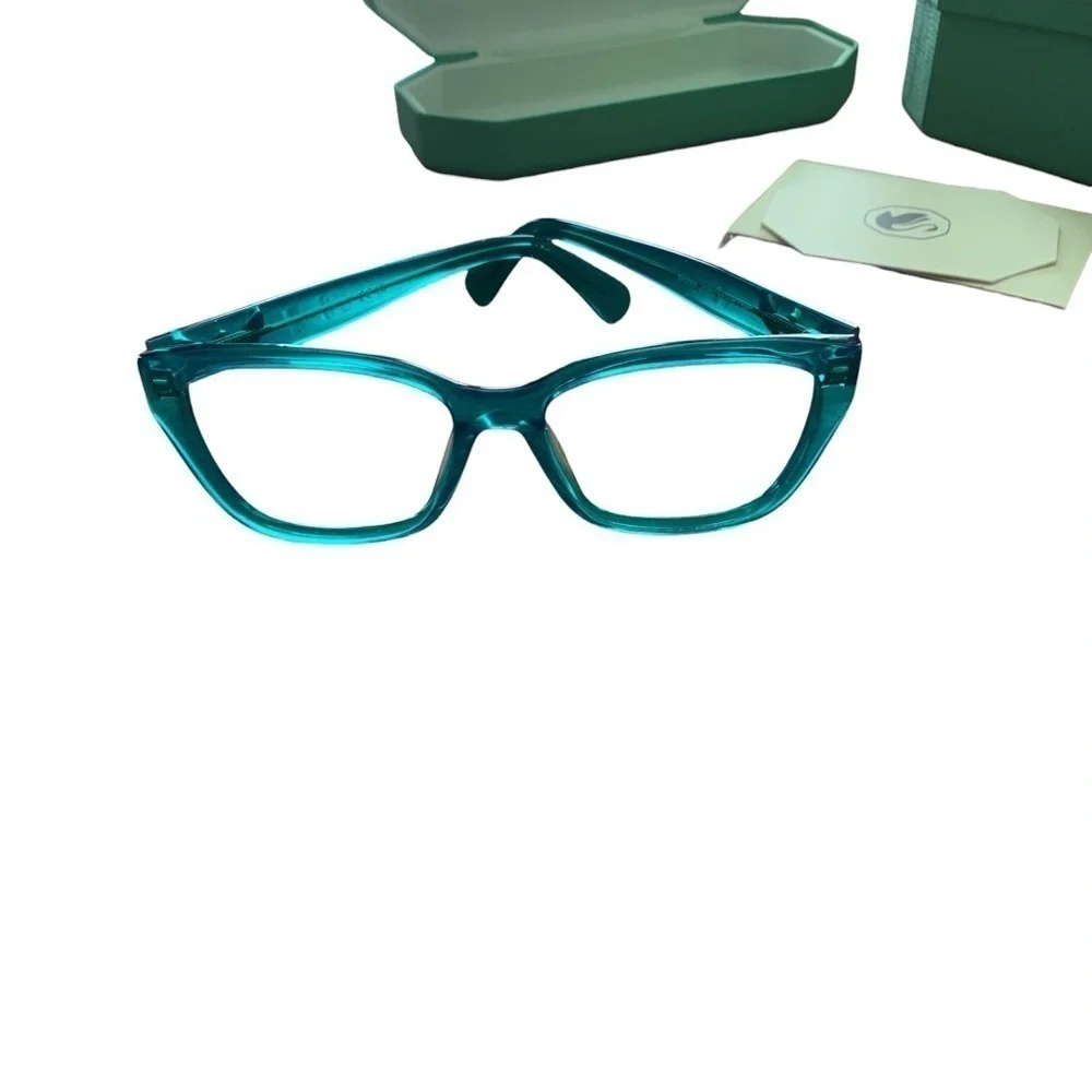 Swarovski green glasses